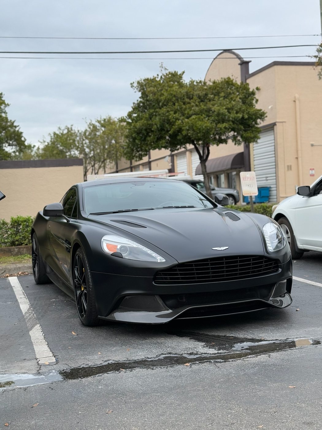 Aston Martin Vanquish - Satin Black protected at Elite Premium Detailing