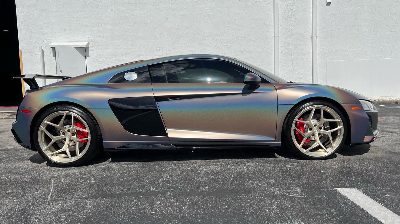 Audi R8 wrapped in holographic chrome film