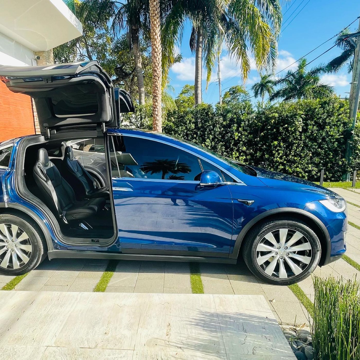 Tesla Model X, deep blue, doors open
