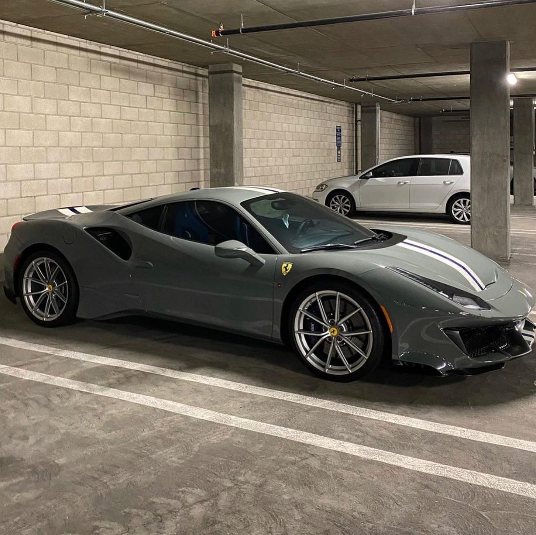 Ferrari 488 Pista paint corrected by Elite inside a client's building garage, 2020