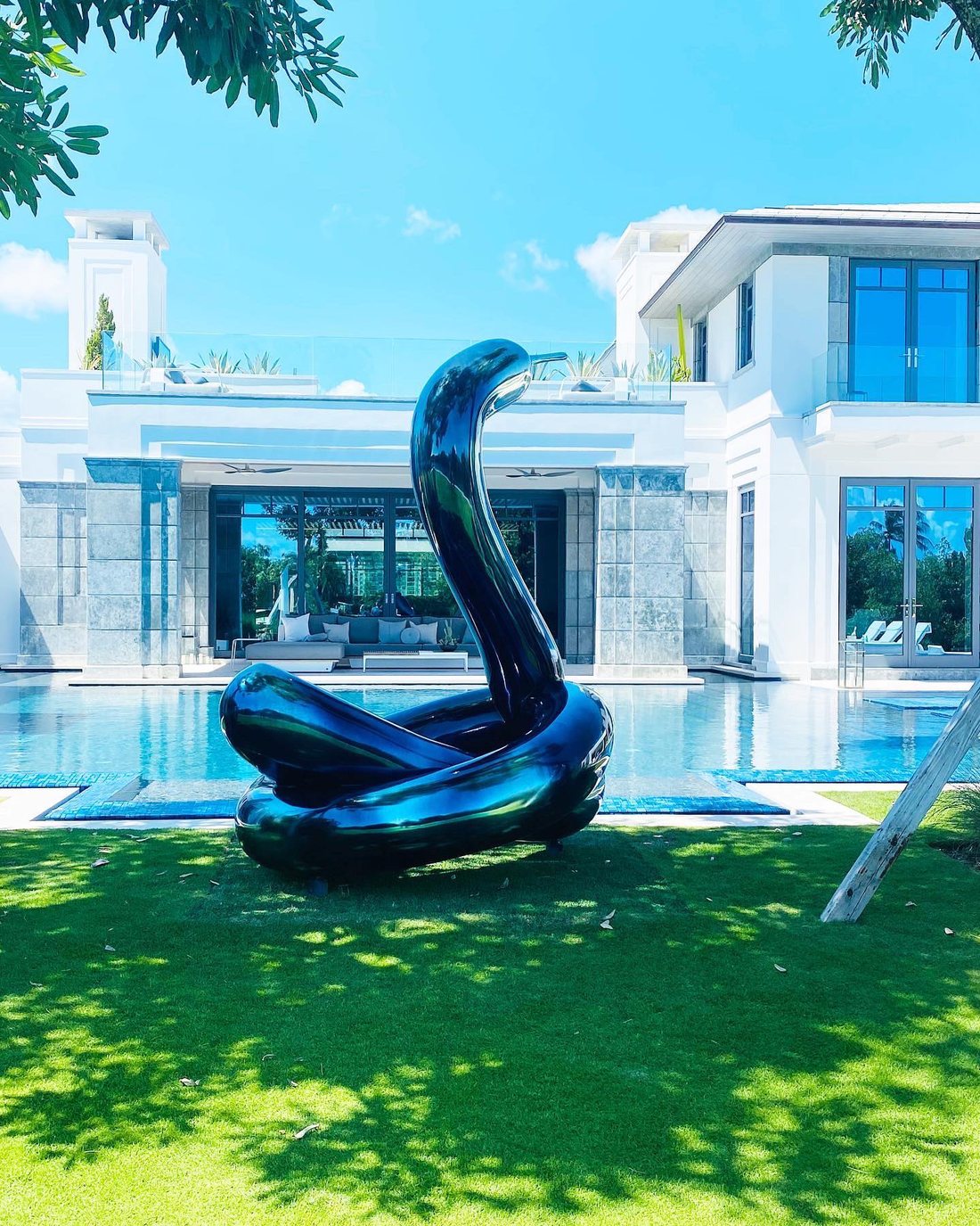 Outdoor sculpture polished and ceramic coated by Elite at a client's Miami pool home
