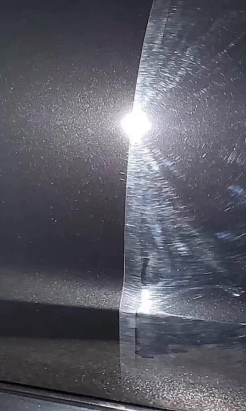 Paint correction 50/50 &mdash; hazy swirled paint corrected to a sharp reflection