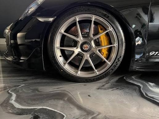 Glossy ceramic coated 911 wheel and yellow caliper