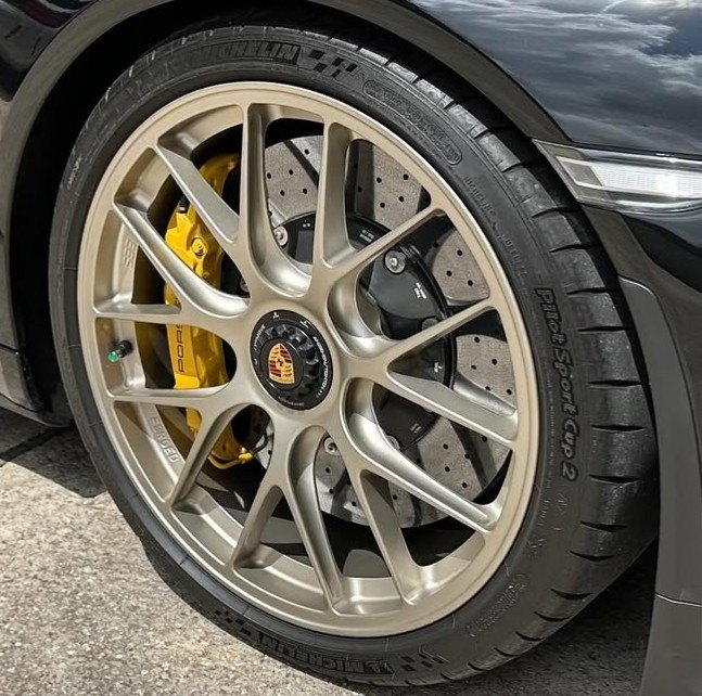 Ceramic coated Porsche wheel with yellow caliper